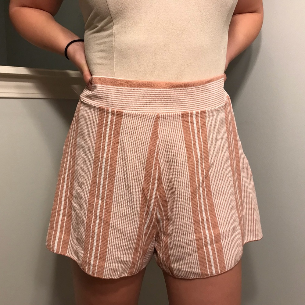 Barely worn, loose-fitted zip-up shorts